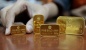 Rabu Pagi Ini, Emas Global dan Domestik Kompak Redup